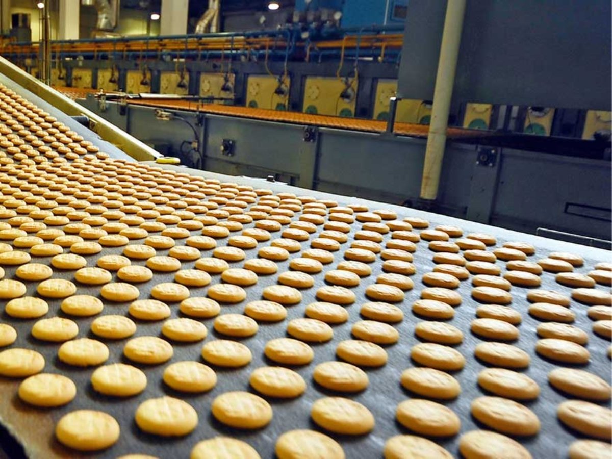 Food products moving along a conveyor belt on a food processing line